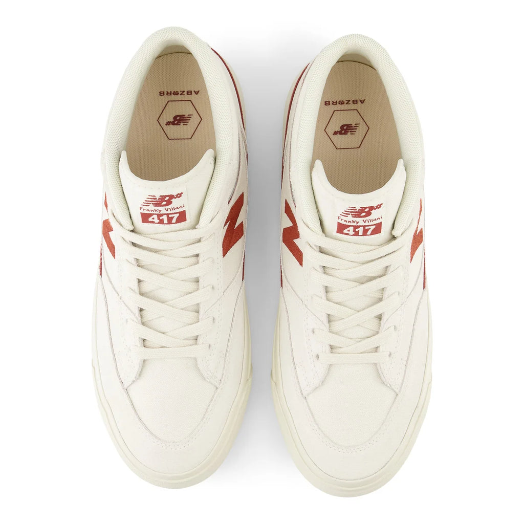 A pair of NB NUMERIC 417 VILLANI WHITE / RED sneakers with a vulcanized sole.