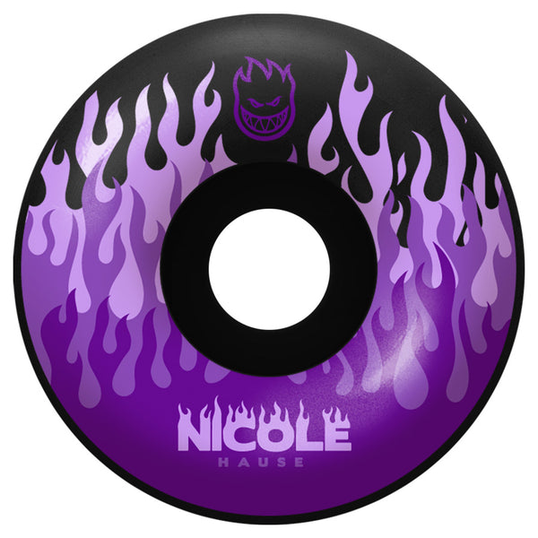 A purple and black skateboard wheel with flames on it, kitted with SPITFIRE HAUSE KITTED F4 99A.