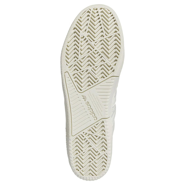 the bottom pattern of the rubber sole with adidas engraved into the center