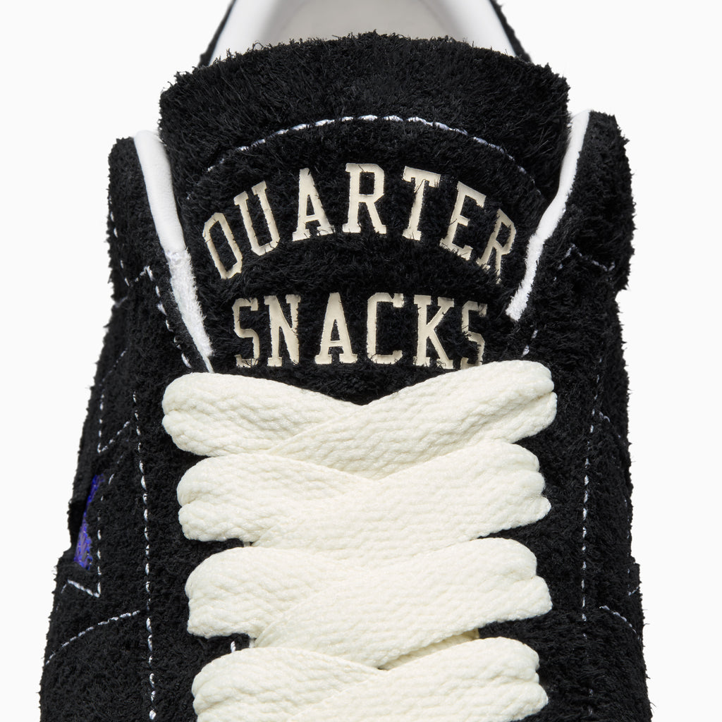 A black CONVERSE x QUARTER SNACKS ONE STAR PRO BLACK sneaker