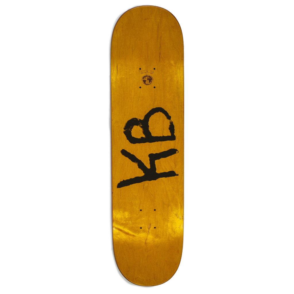 A FUCKING AWESOME K.B. ZOOM yellow skateboard with the word kb written on it.
