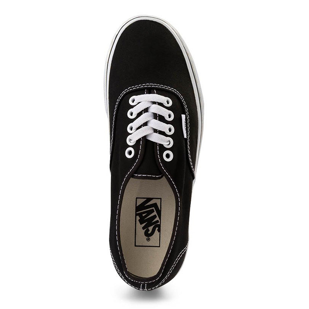 The VANS AUTHENTIC BLACK / WHITE is a low-top black shoe from VANS with white laces, a white sole, Vans logo on the insole, and signature rubber waffle outsole, shown from an overhead view.