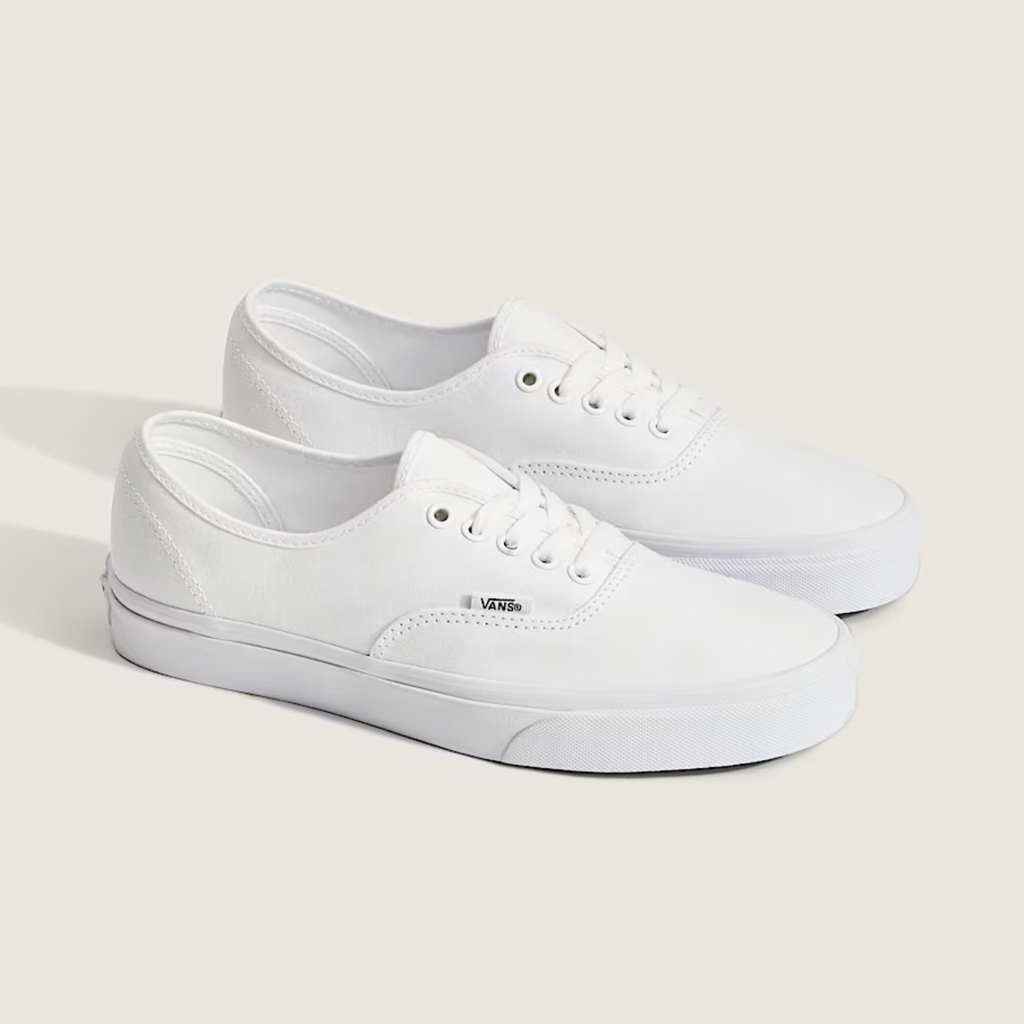 A pair of VANS AUTHENTIC TRUE WHITE low-top shoes with signature rubber waffle outsoles, from VANS, are displayed side by side on a neutral background.