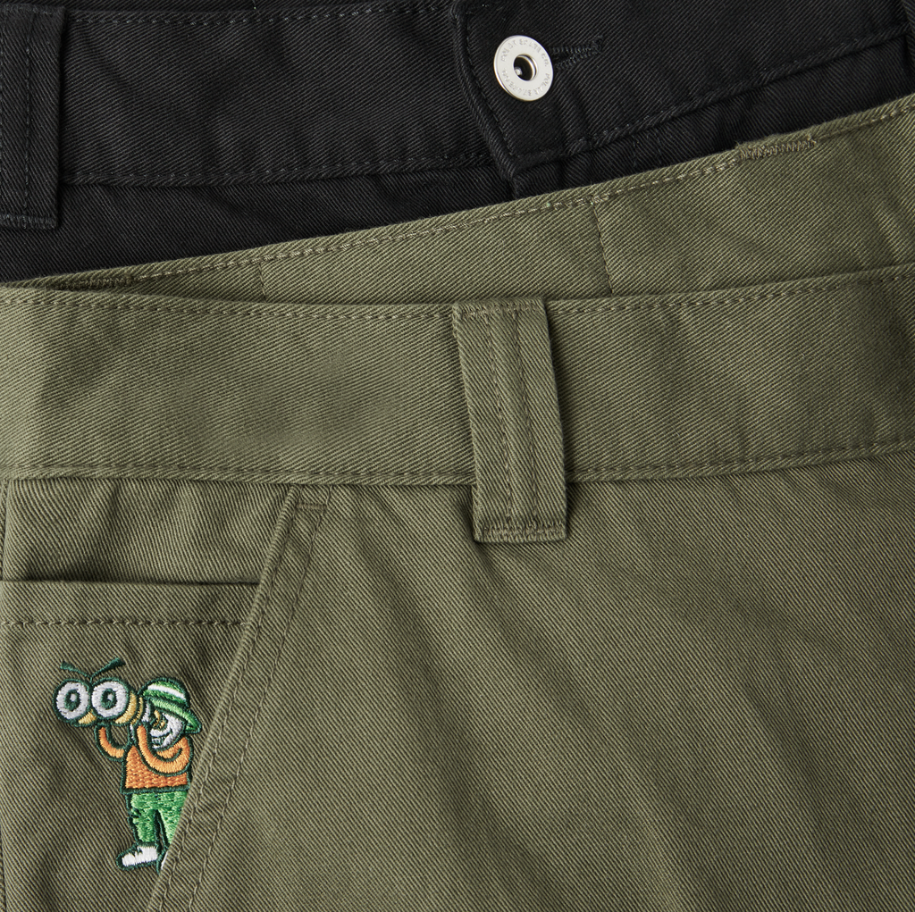A close up of a pair of POLAR '93! CARGO KHAKI GREEN pants from the brand POLAR.