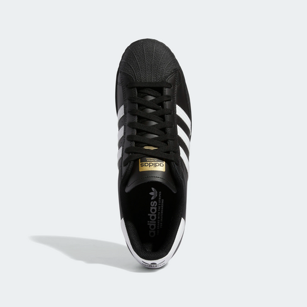 A pair of black and white Adidas Superstar ADV Core Black/Flat White sneakers on a white background.