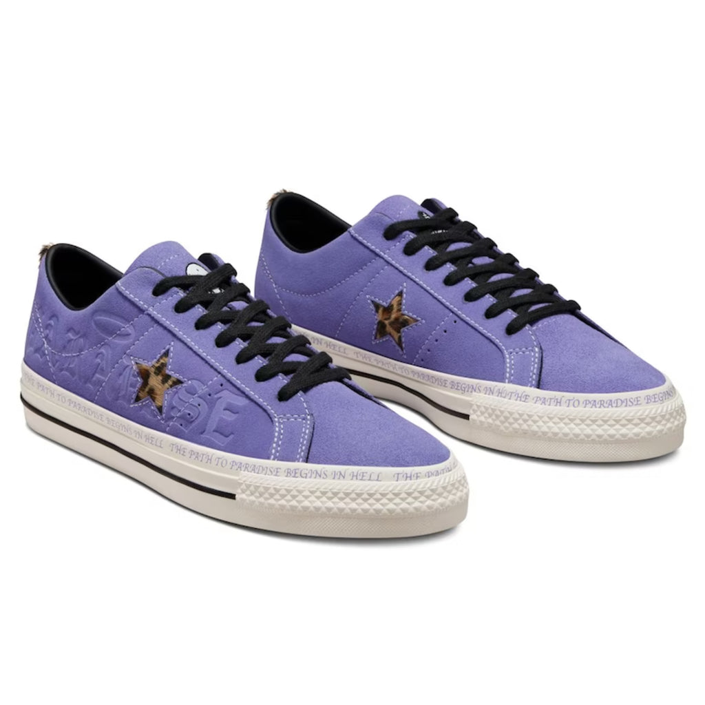 A pair of wild lilac CONVERSE CONS X PARADISE SEAN PABLO ONE STAR PRO OX sneakers with a star on the side.