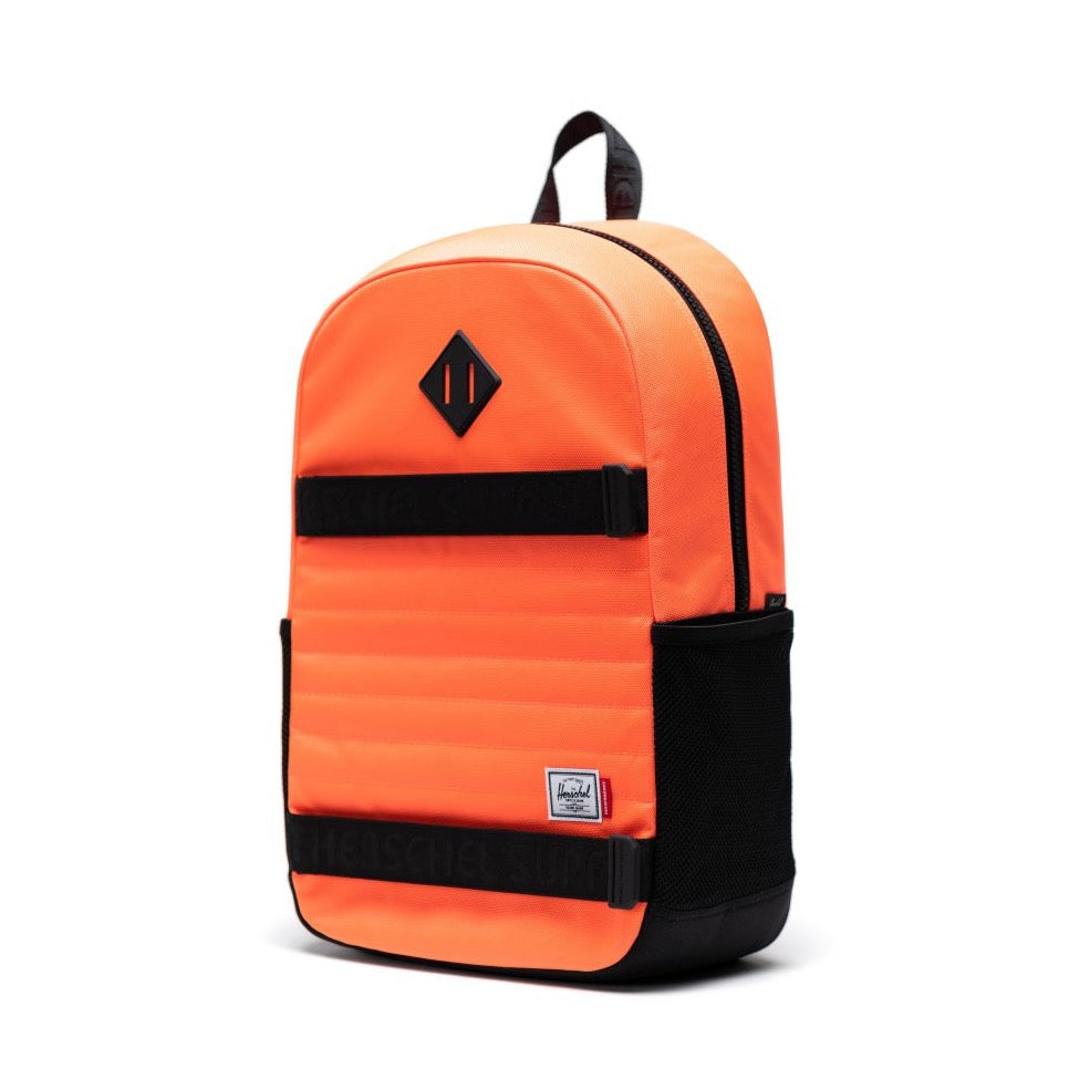 another view of the bright orange backpack with black accents and straps
