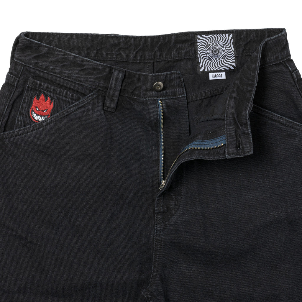 A black SPITFIRE BIGHEAD FILL DENIM SHORT BLACK with a red logo from DELUXE.