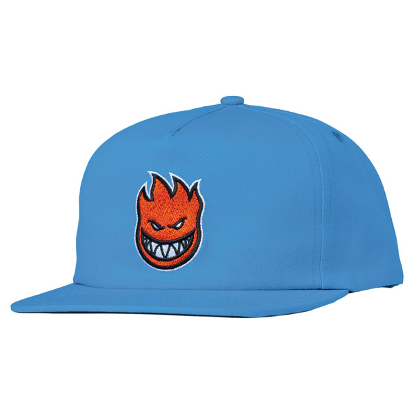 A SPITFIRE Bighead Fill snapback light blue/red hat with a cartoon face on it.