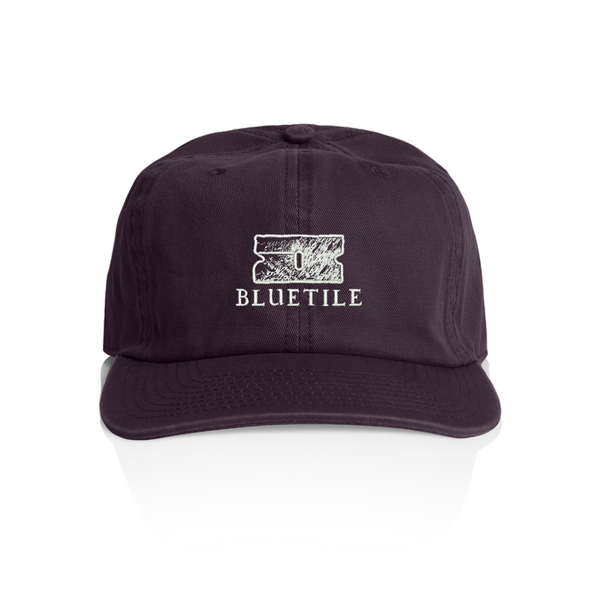 A casual fit hat with embroidery of a razor and the word "bluetile".