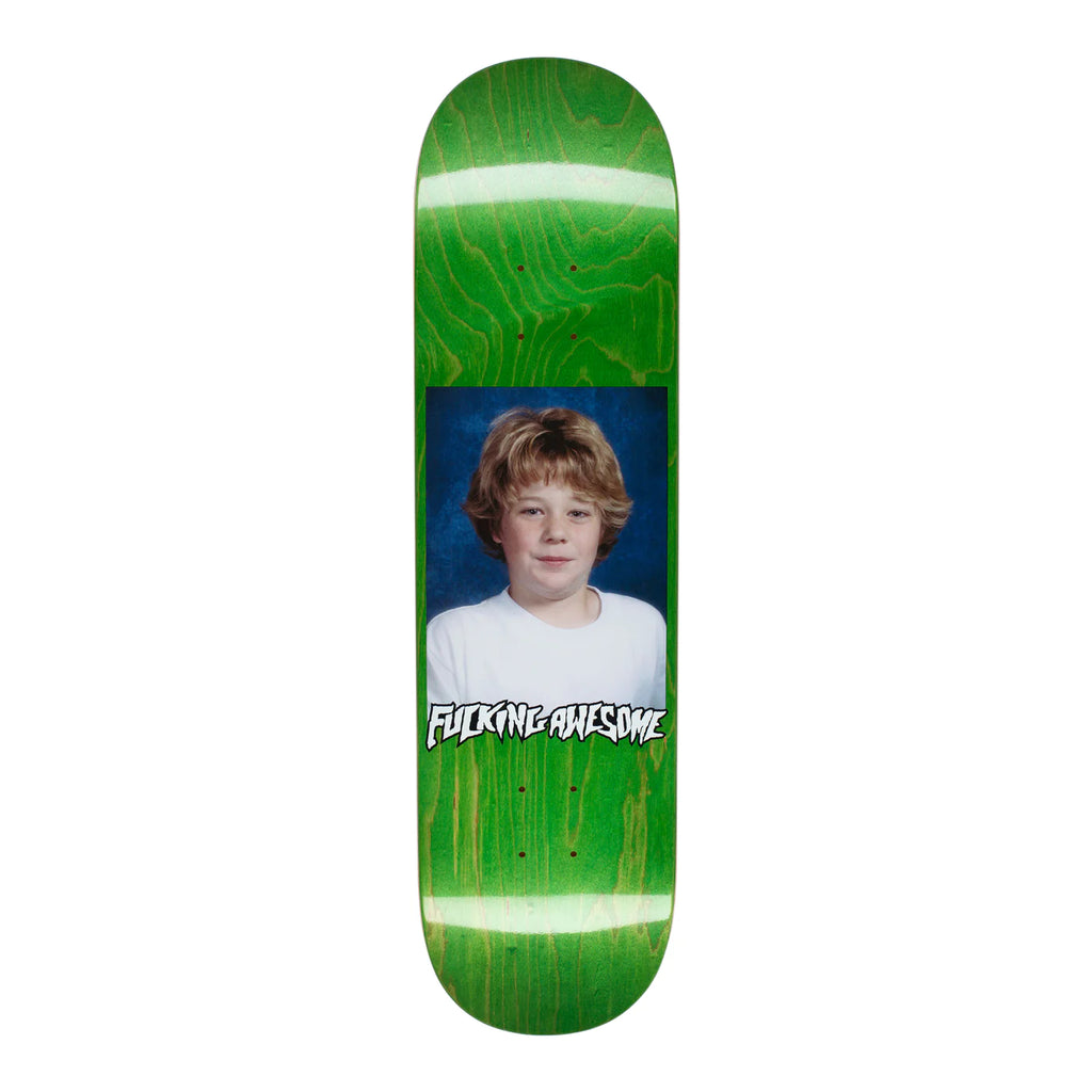 A green skateboard with FUCKING AWESOME's ANDERSON CLASS PHOTO, showcasing various stains.
