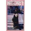 A pink HOCKEY CD with a digital print of a man on a skateboard.