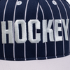 A close up of the word "hockey" embroidered on the front of the hat.