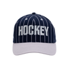 A navy baseball style hat with lilac stripes and brim, with the word "Hockey" embroidered across the front.