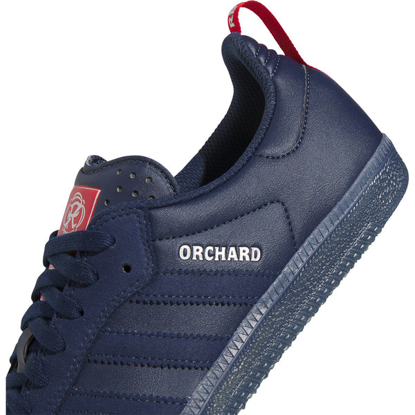 Adidas x Orchard Samba Adv Night Indigo / Silver trainers in navy and red.