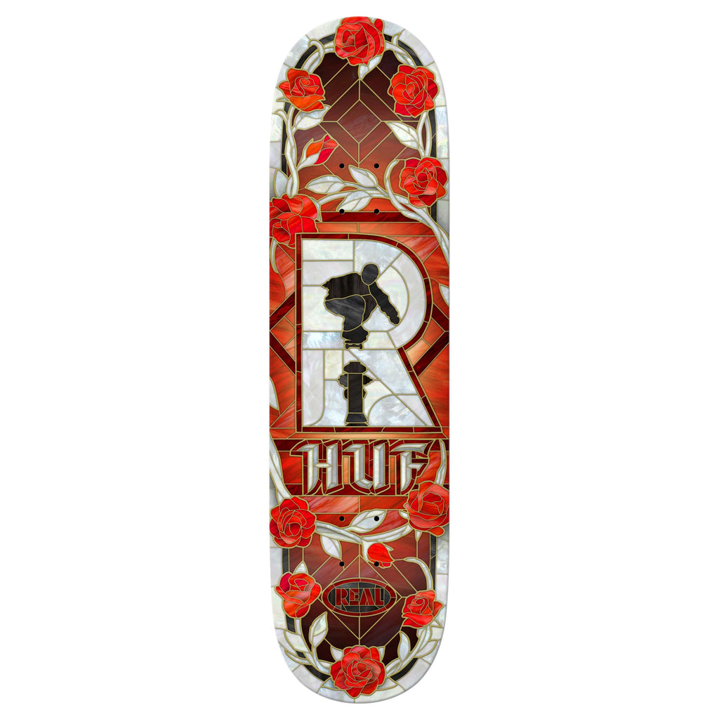 The REAL HUF CATHEDRAL skateboard deck by REAL features Mason Vicious construction, a red roses and patterned background design with a large "R," plus both HUF and REAL logos.