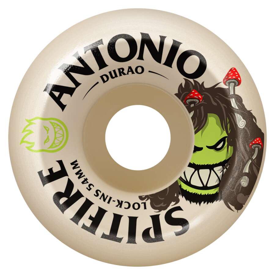 A SPITFIRE F4 DURAO BURN SQUAD LOCK-INS 99D 54MM wheel featuring a green grinning face with mushrooms in its hair, and "ANTONIO DURAO SPITFIRE BURN SQUAD LOCK-INS 54MM" text on the side. Made with Formula Four urethane.