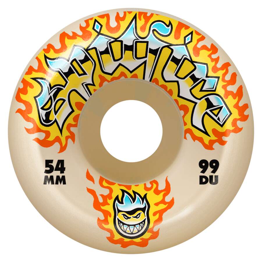 The SPITFIRE F4 CHROME VENOM CONICAL FULL 99D 54MM wheel features orange and yellow flames, graffiti-style "Spitfire" text, a flame-faced cartoon, "54 MM," "99 DU," and Radial Full 99D detailing.