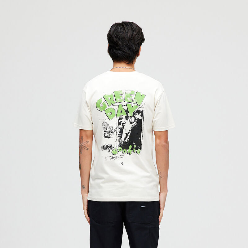 A man in a STANCE X GREEN DAY 1994 TEE made from a combed cotton blend for comfort.