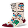 A cream colored pair of socks that has the classic tootsie pop cartoon owl on them.