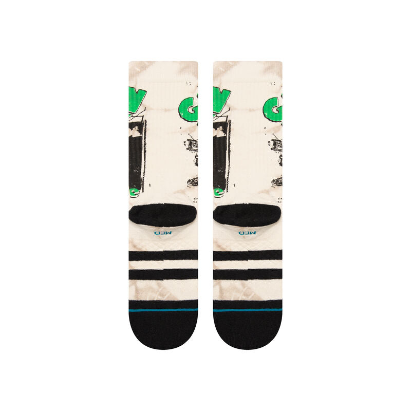 A pair of white STANCE socks x Green Day 1994 Large with an image of a man riding a bike.