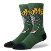 A green STANCE SOCKS X WELCOME SKATEBOARDS WILBUR LARGE sock with a skeleton on it by Stance.