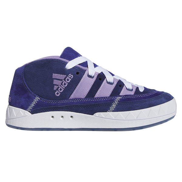 An ADIDAS ADIMATIC MID X MAITE VICTORY BLUE / MAGIC LILAC skateboarding shoe with blue and purple colors and white stripes.