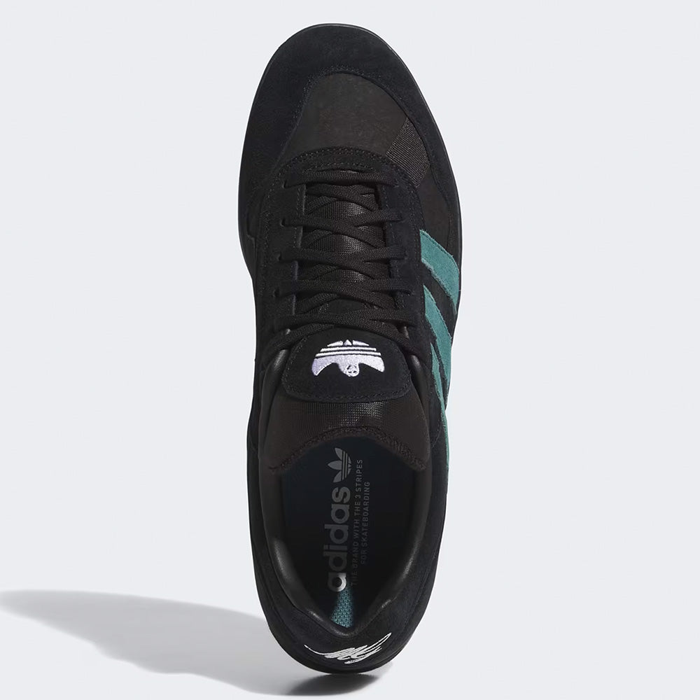Top view of the ADIDAS GONZ ALOHA SUPER CORE BLACK / PRELOVED TEAL sneaker, featuring a black suede upper, teal stripes, and a white Adidas logo on the tongue and insole.