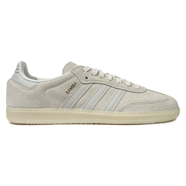 The ADIDAS SAMBA ADV CRYSTAL WHITE / GREY ONE shoes feature a suede texture, iconic white stripes, and an off-white textured sole. Enhanced with Adituff toe reinforcement, they offer durability ideal for skateboarding enthusiasts.