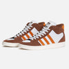 ADIDAS SUPERSKATE ADV PRELOVED BROWN / RUSTIC ORANGE high-top sneakers with brown suede, orange stripes, white accents, and laces by ADIDAS are displayed on a plain white background.