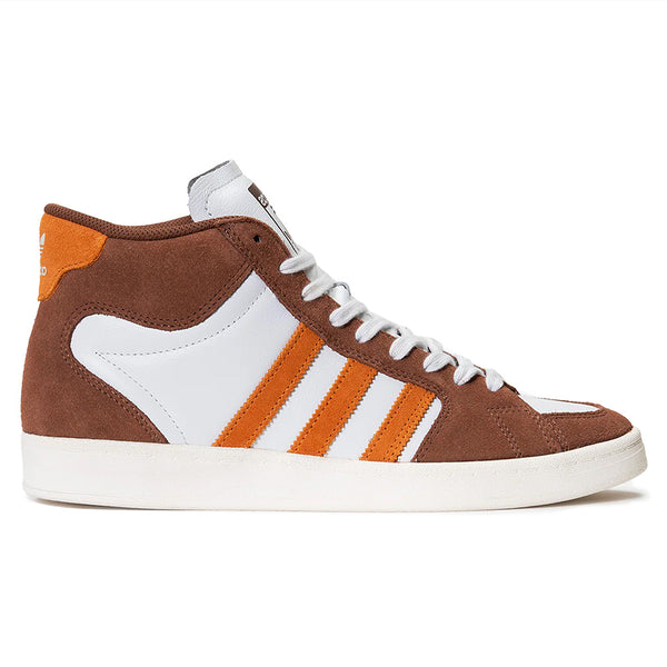 The ADIDAS SUPERSKATE ADV in Preloved Brown and Rustic Orange features high-top styling, orange stripes, white accents and laces, and a white sole, shown against a plain background.