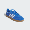 The ADIDAS SAMBA ADV in Blue Bird/Cloud White features a suede upper with Adituff toe reinforcement, white stripes, a brown rubber cupsole, and "Samba" in gold metallic for elegance.