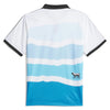 The ADIDAS SKATEBOARDING X BLACK SHEEP X CFC THREE STRIPES POLO is a game day essential, featuring short sleeves and horizontal wave patterns in white, light blue, and dark blue. Complete with a small sheep graphic near the bottom right, black collar and sleeve cuffs, it's crafted with moisture-managing AEROREADY technology.