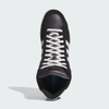 Top-down view of the ADIDAS SUPERSKATE ADV in Core Black, Crystal White, and Off White—suede upper, white laces, and signature white stripes. Classic ADIDAS skateboarding shoes shown against a light background.