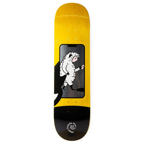 A yellow ALIEN WORKSHOP SHEEPLE HOLE skateboard with an image of a sheep on it.