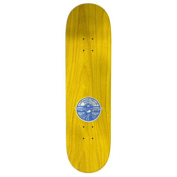 top of colored stained skateboard with small graphic