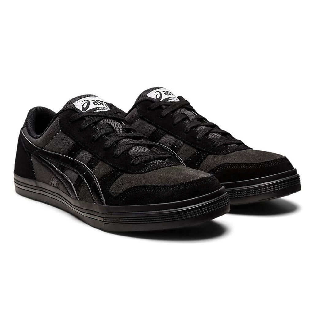 A black and white ASICS AARON PRO GRAPHITE GREY / BLACK sneaker, featuring the GEL-VICKKA PRO technology by ASICS. Perfect for skateboarders, this shoe also showcases sleek black soles.