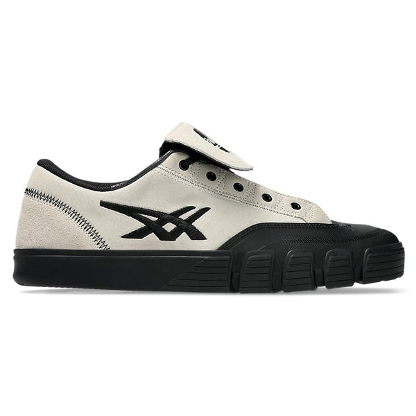 Side view of an ASICS GEL-FLEXKEE PRO 2.0 CREAM / BLACK sneaker with black accents and suede paneling, featuring a zipper detail, velcro closure, and thick rubber sole.