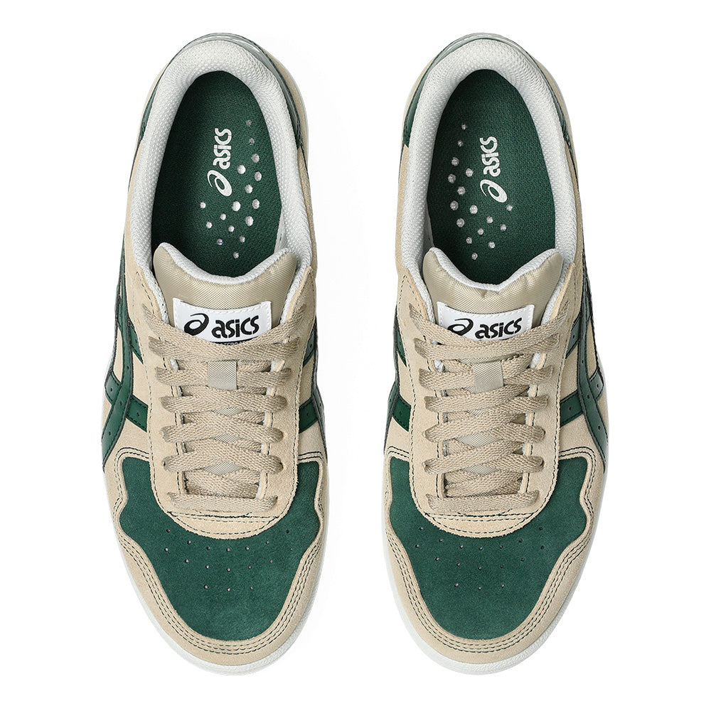The ASICS JAPAN PRO WOOD CREPE / EVERGREEN sneakers in beige and green, shown from above with tied laces and visible branding on the tongue and insole, boast a sleek design inspired by classic skate shoes.