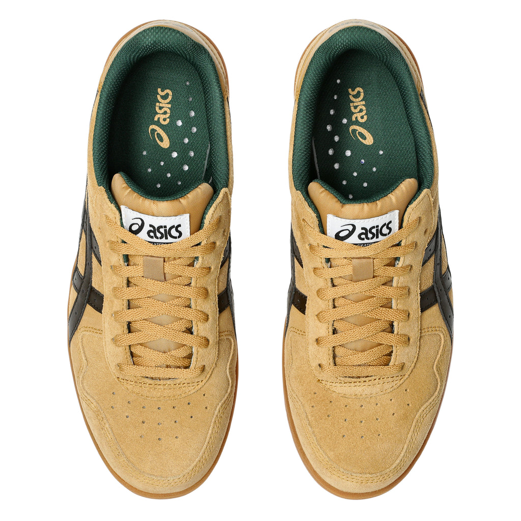 Top view of a pair of ASICS JAPAN PRO WOOD THRUSH / BLACK COFFEE sneakers, showcasing tan with black accents and green interiors, finished with a subtle reflective detail.