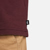 A close up of a NIKE SB LOGO SKATE TEE BURGUNDY CRUSH from nike.