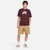 A man in a Nike SB Logo Skate Tee Burgundy Crush.
