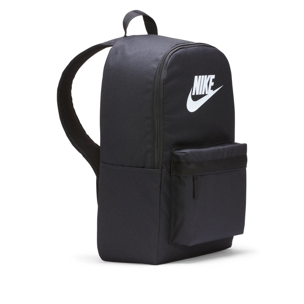 The Nike Heritage Backpack Black features padded straps, water-resistant material, and a front zip pocket. Ideal for daily use, its practical design includes secure laptop storage for on-the-go convenience, with a stylish white swoosh logo.