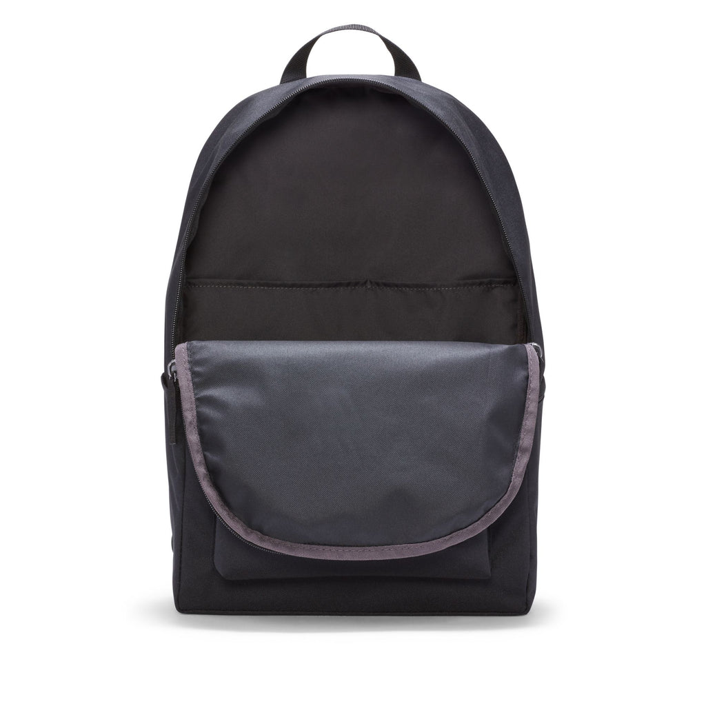 The Nike Heritage Backpack Black features a sleek design with a large front pocket and zippered closure. It's made from water-resistant material, includes a top carrying handle, adjustable shoulder straps, and offers dedicated laptop storage for daily essentials.