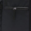 Close-up of the black Nike Heritage Backpack highlights a zippered compartment with a metal pull, made from water-resistant material.