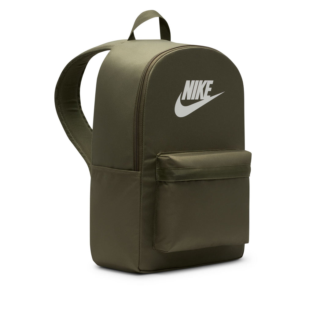 The NIKE HERITAGE BACKPACK MEDIUM OLIVE by nike is made from recycled polyester, features a green design with a front zip pocket, white Nike logo on the top front, and an interior laptop sleeve, pictured on a plain white background.