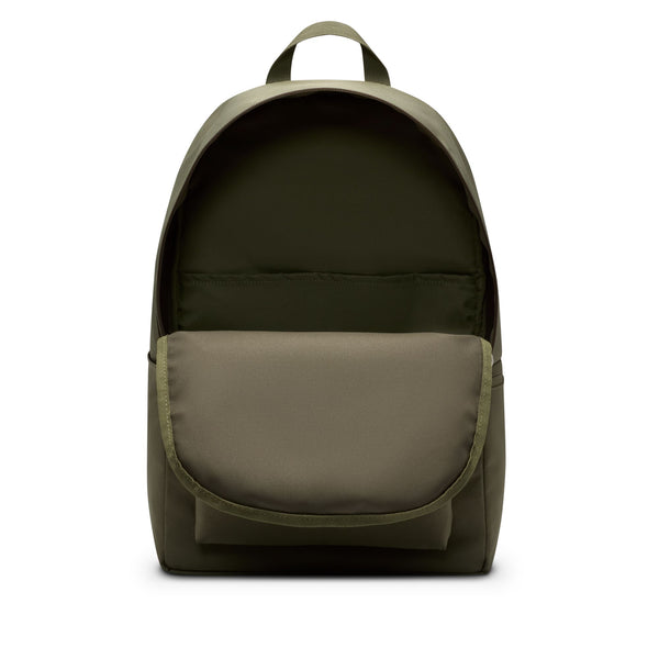 The NIKE HERITAGE BACKPACK MEDIUM OLIVE by nike is shown against a white background, featuring a spacious main compartment, large front pocket, top handle, and made from recycled polyester.