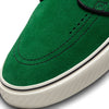 A pair of nike SB Zoom Janoski OG+ Gorge Green / Action Green shoes with white soles.