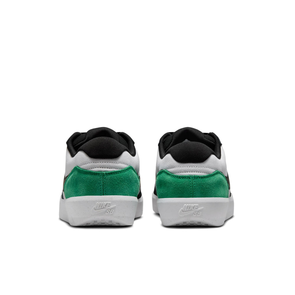 The NIKE SB Force 58 sneakers, in white/black-stadium green, display a heritage basketball style with black accents and a Nike logo on the heel, ensuring durability and timeless appeal.