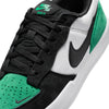 A close-up of the NIKE SB FORCE 58 in white, black, and stadium green with a black swoosh and white sole highlights its heritage basketball design and durability.